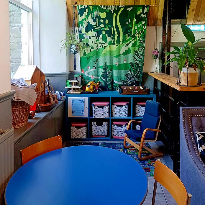 the childrens corner with toys and games at cafe recharge in galashiels