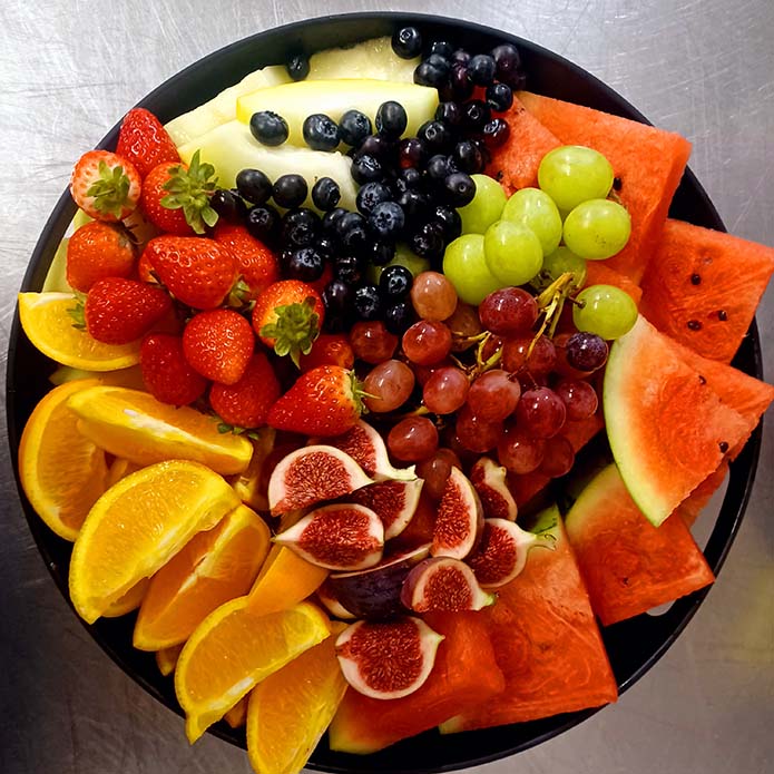 a colourful fruit platter for catering at cafe recharge in galashiels
